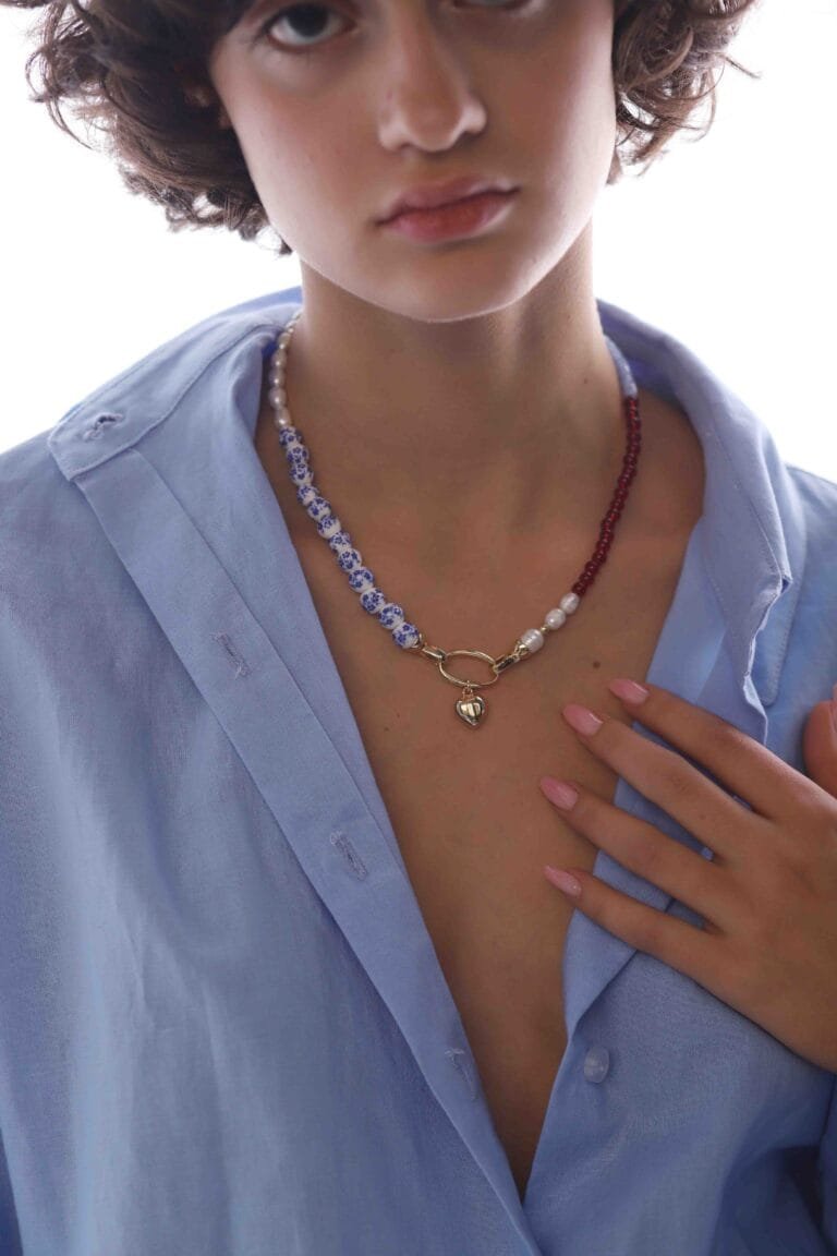 Natural freshwater pearls, brass pendant, ceramics, glass beads, garnet stone